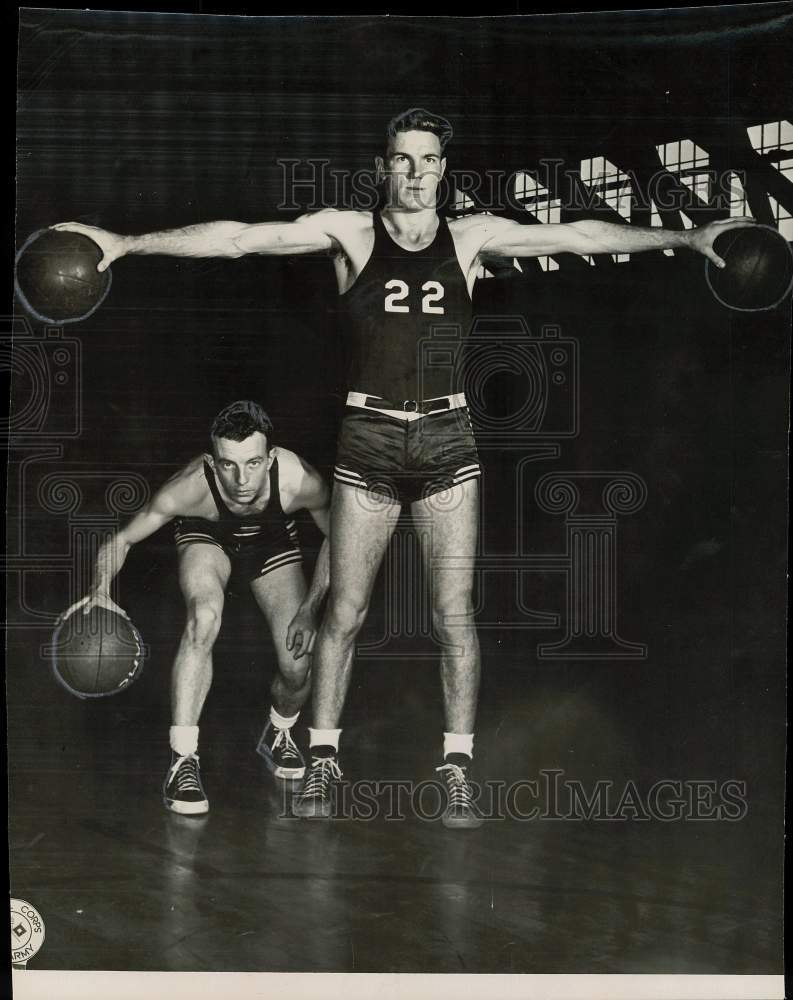 Press Photo Basketball players pose with ball - sas23777- Historic Images