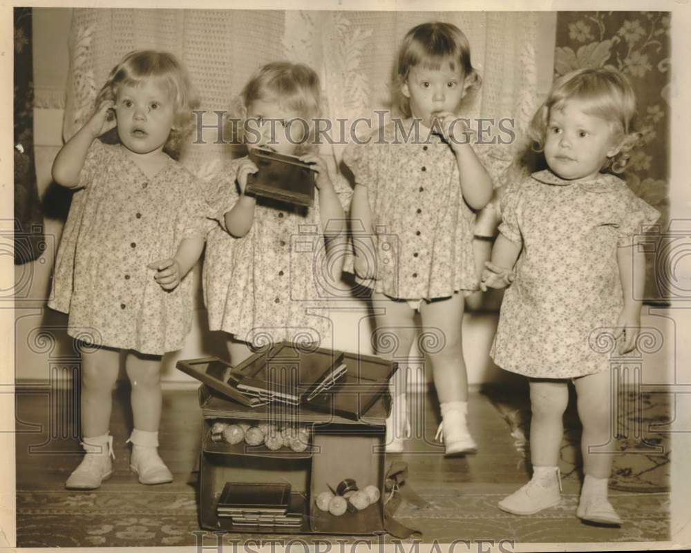 1940 Press Photo One Year Old Quadruplet Sisters at Home - sax08601