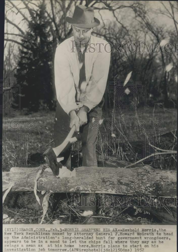 1952 Press Photo Attorney General Newbold Morris cuts wood, Sharon, Connecticut- Historic Images