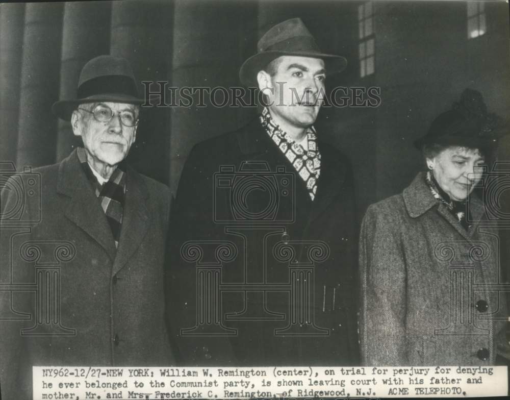 Press Photo William W. Remington leaving court with his parents, New York- Historic Images