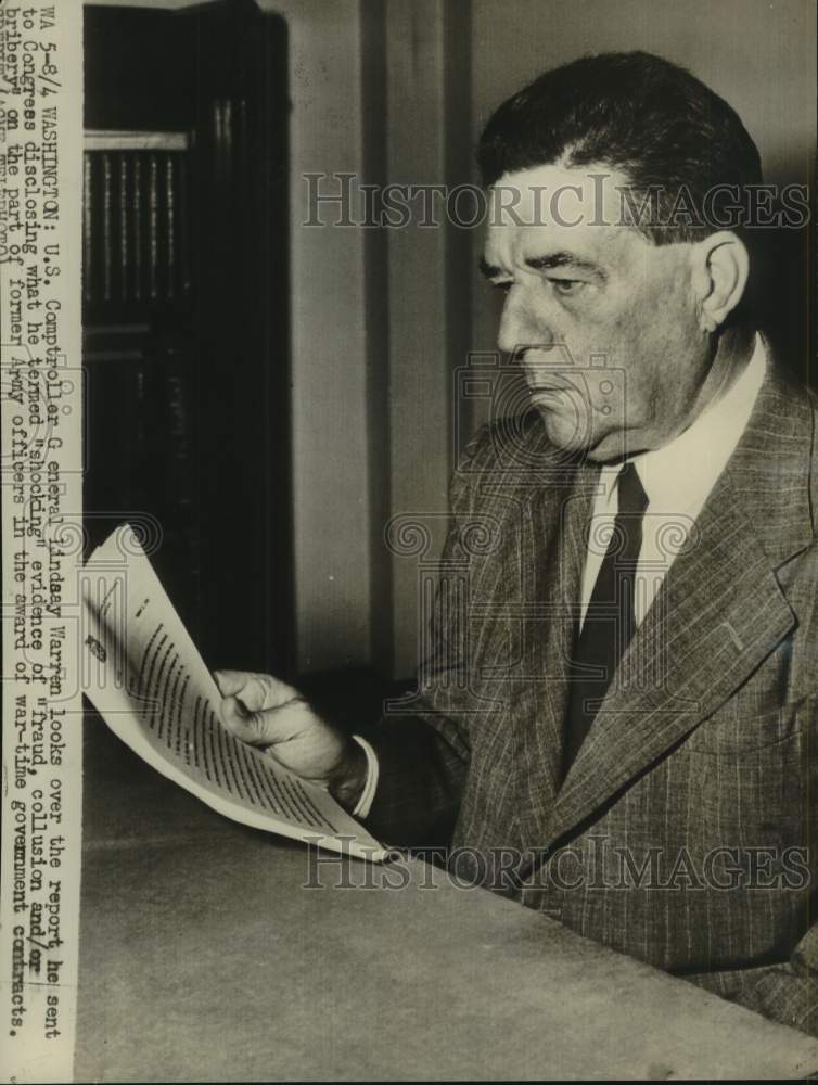 1952 Press Photo US Comptroller General Lindsay Warren Reads Report, Washington- Historic Images