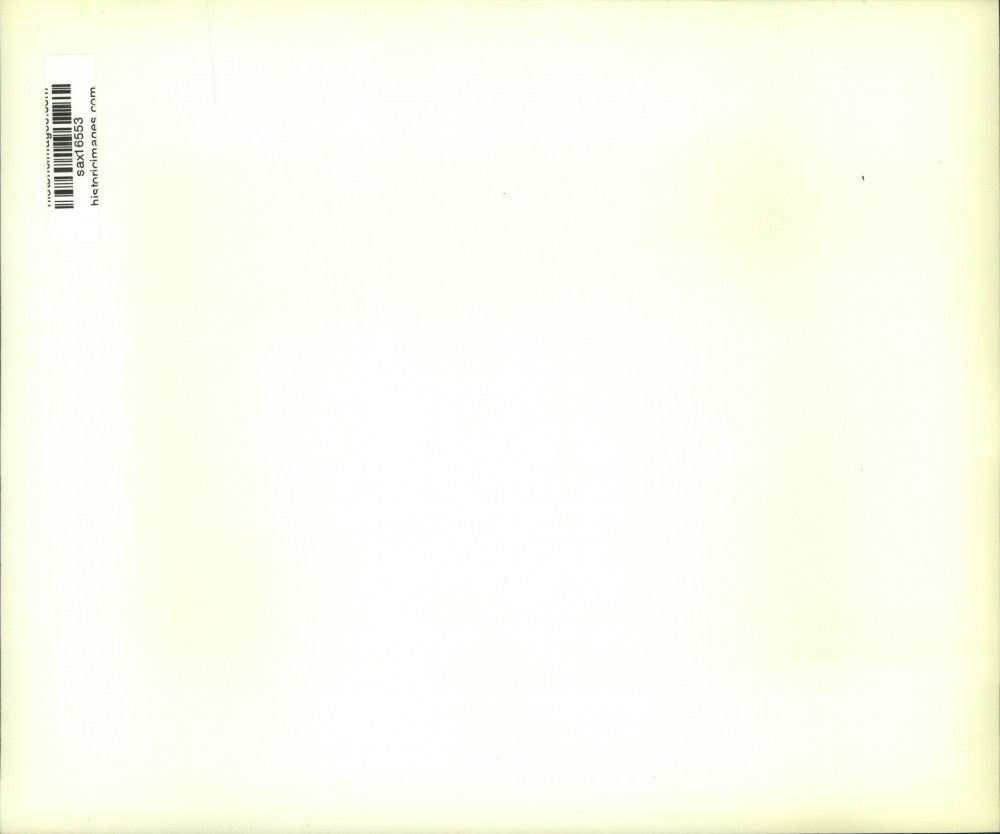 Press Photo Black longshoreman takes break on Capetown, South Africa, waterfront