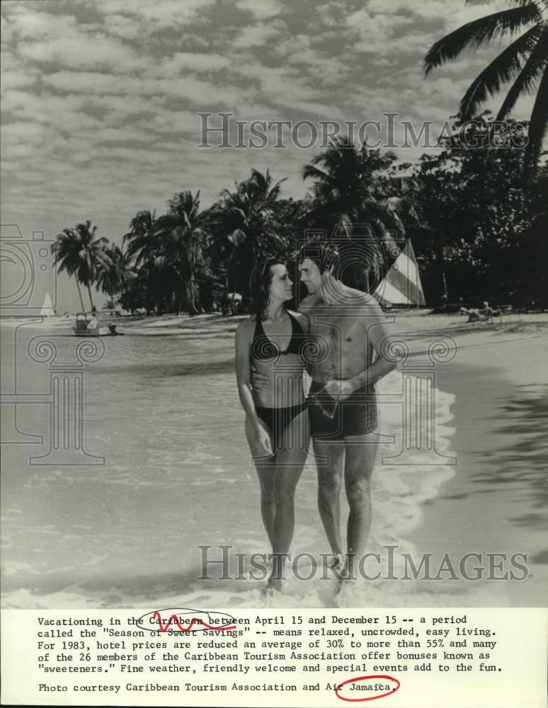 1983 Press Photo Couple vacationing in Caribbean. - sax17071