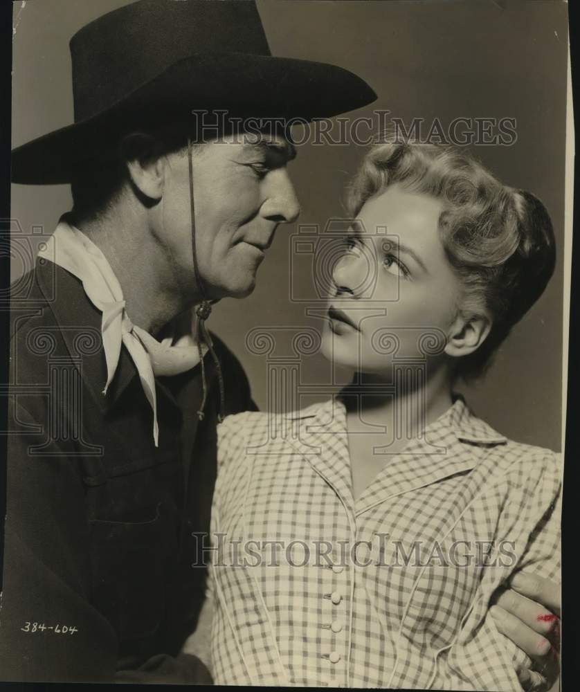 Press Photo Actors Randolph Scott and Dolores Dorn - sax17263- Historic Images