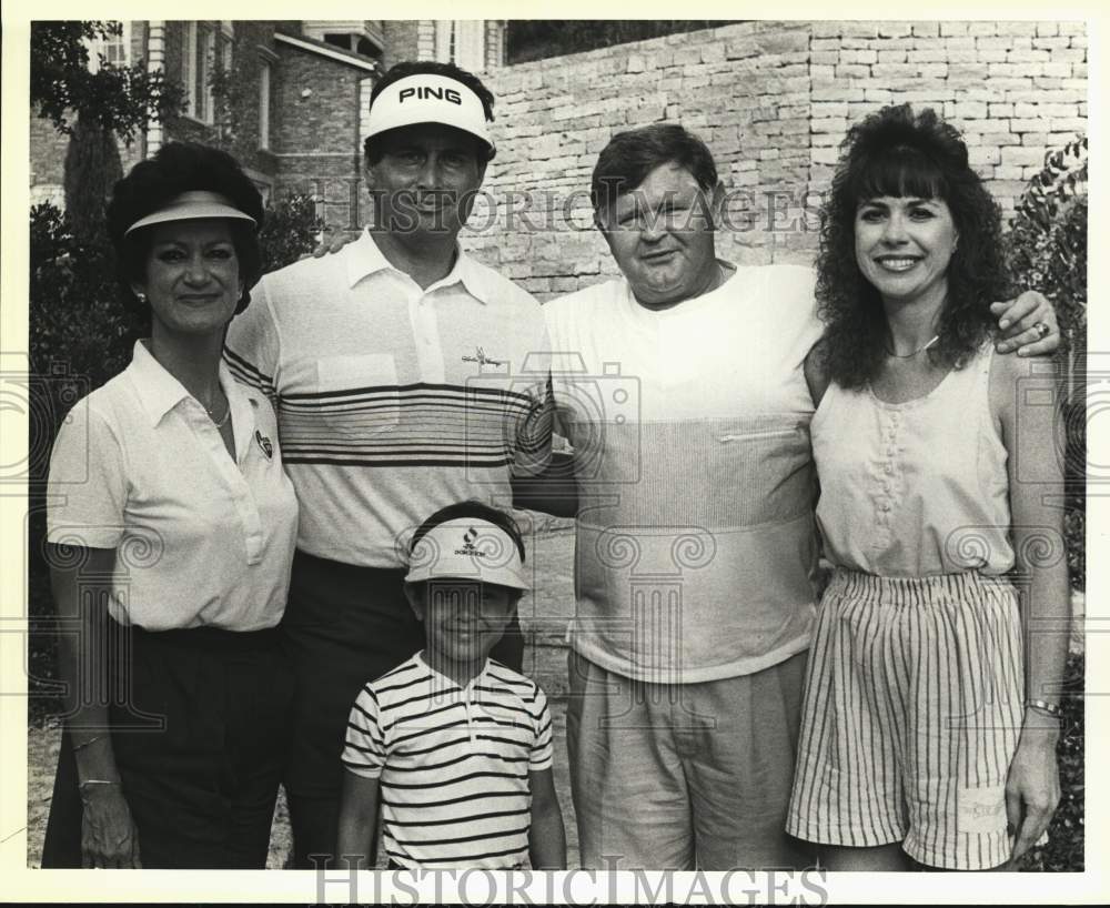 1988 Press Photo Humana Health Golf Benefit officers pose with boy at event, TX- Historic Images