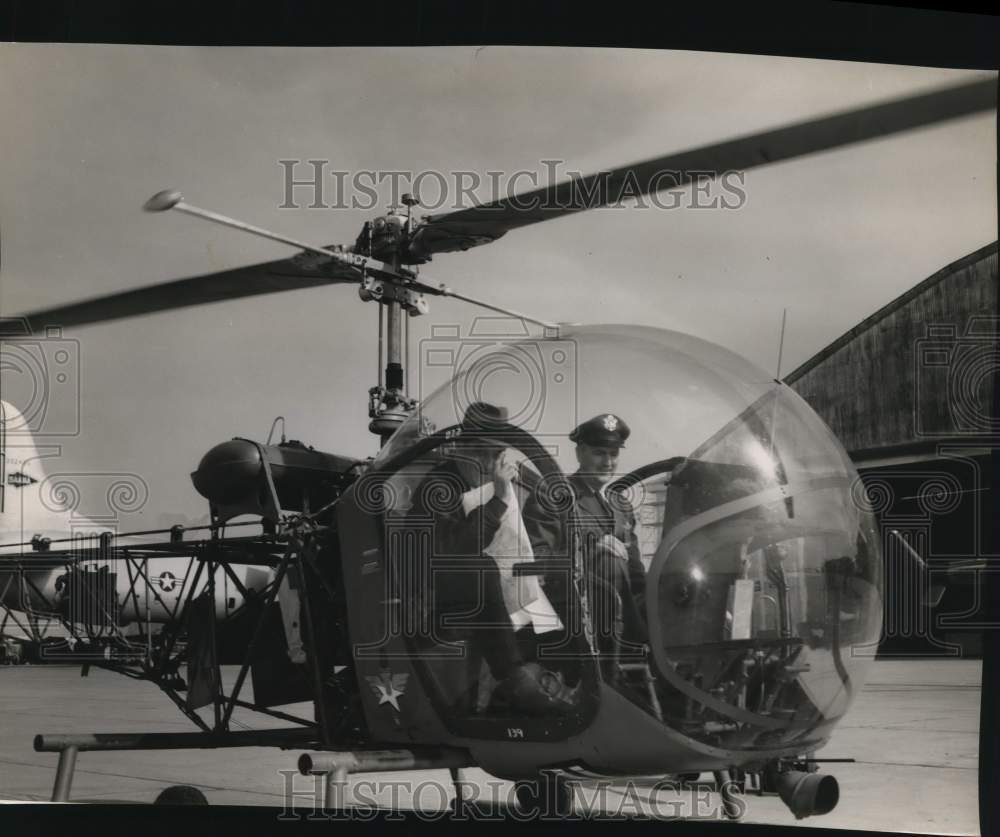 Press Photo Air Force Secretary Harold Talbott rides a helicopter - sax20304