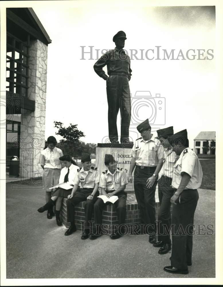 Press Photo Douglas MacArthur statue surrounded by uniformed youth - sax23500- Historic Images