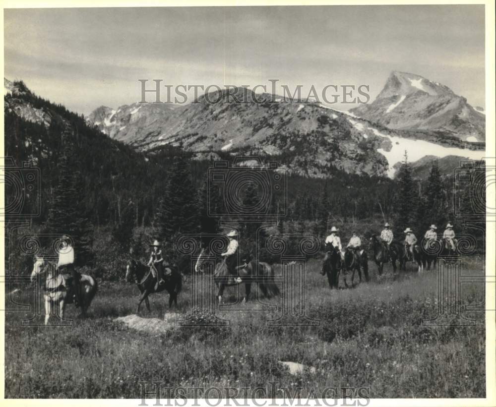 Press Photo Riders explore Indian Peaks near Mt. Sawtooth &amp; Continental Divide- Historic Images