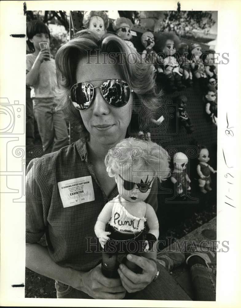 1984 Press Photo Judy Heady shows off her punk dolls at Starving Artist's show- Historic Images