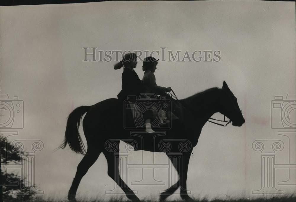 1957 Press Photo Two girls horseback riding- Historic Images