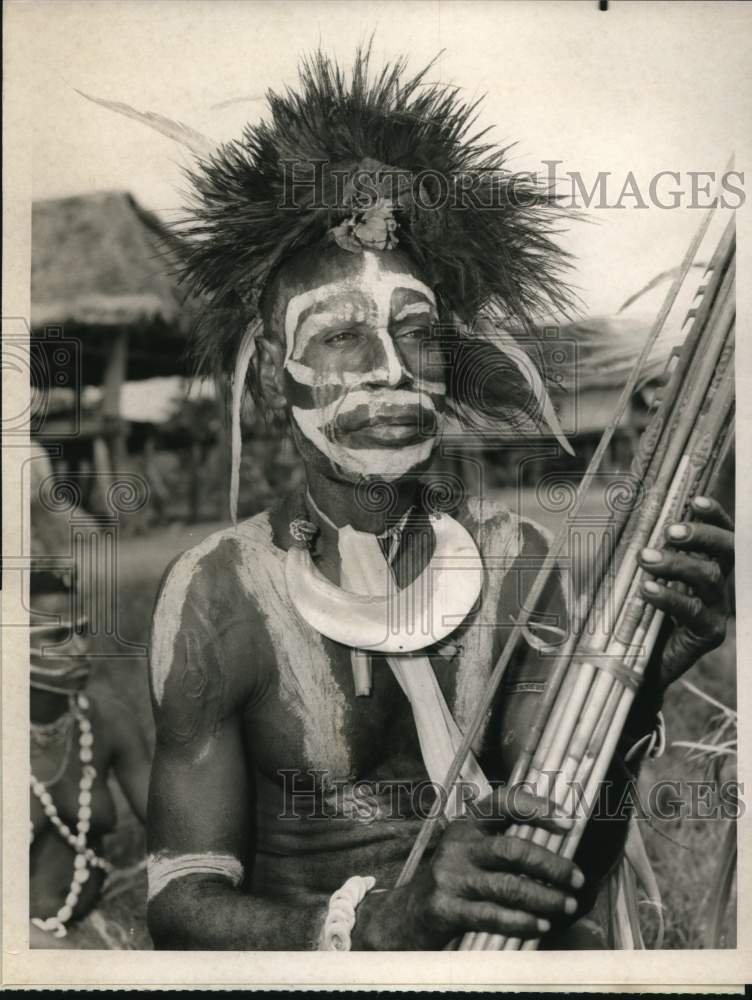 Press Photo Native with Weapons in "Lowell Thomas in New Guinea" on NBC-TV