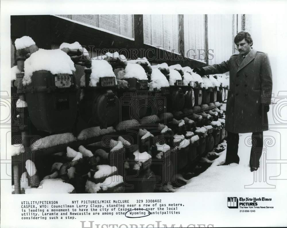 Press Photo Councilman Larry Clapp near row of gas meters in Casper, Wyoming- Historic Images