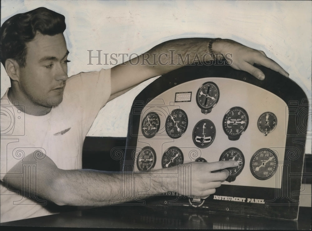 Press Photo Bob Kennedy points to instrument panel - sba01387- Historic Images