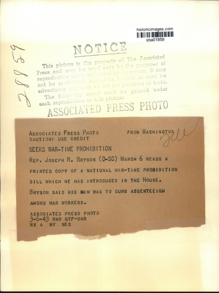 1943 Press Photo Rep.Joseph R.Bryson holds a copy of Natl.War-Time Prohibition.