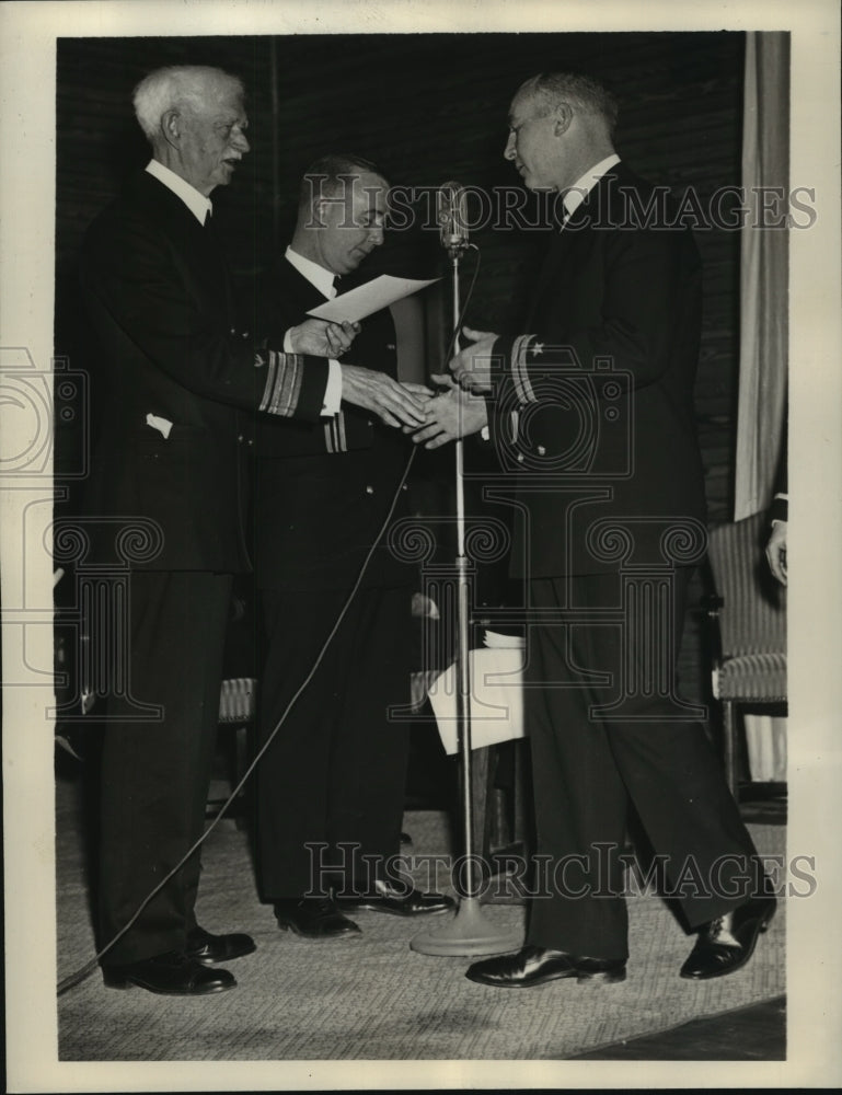 1943 Press Photo Ray Flaherty Receives Commission from Rear Admiral George Rock