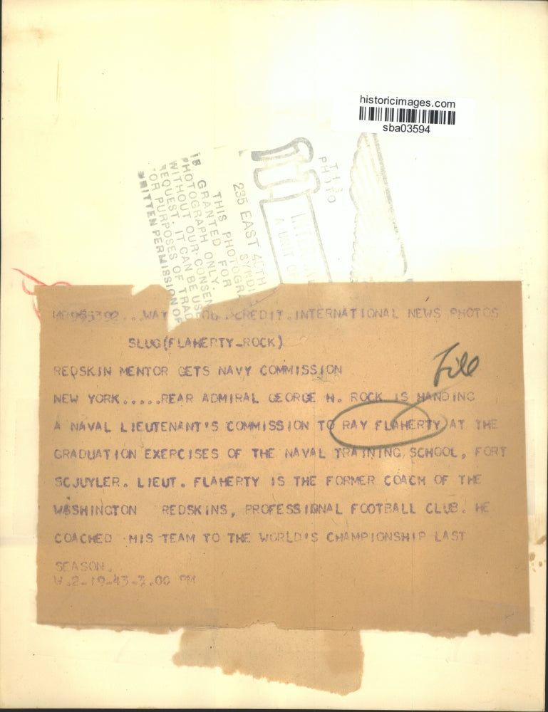 1943 Press Photo Ray Flaherty Receives Commission from Rear Admiral George Rock