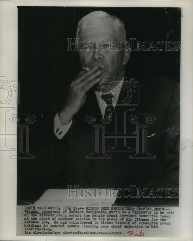 1953 Press Photo Secretary of Defense Designate Charles Wilson smokes cigarette- Historic Images