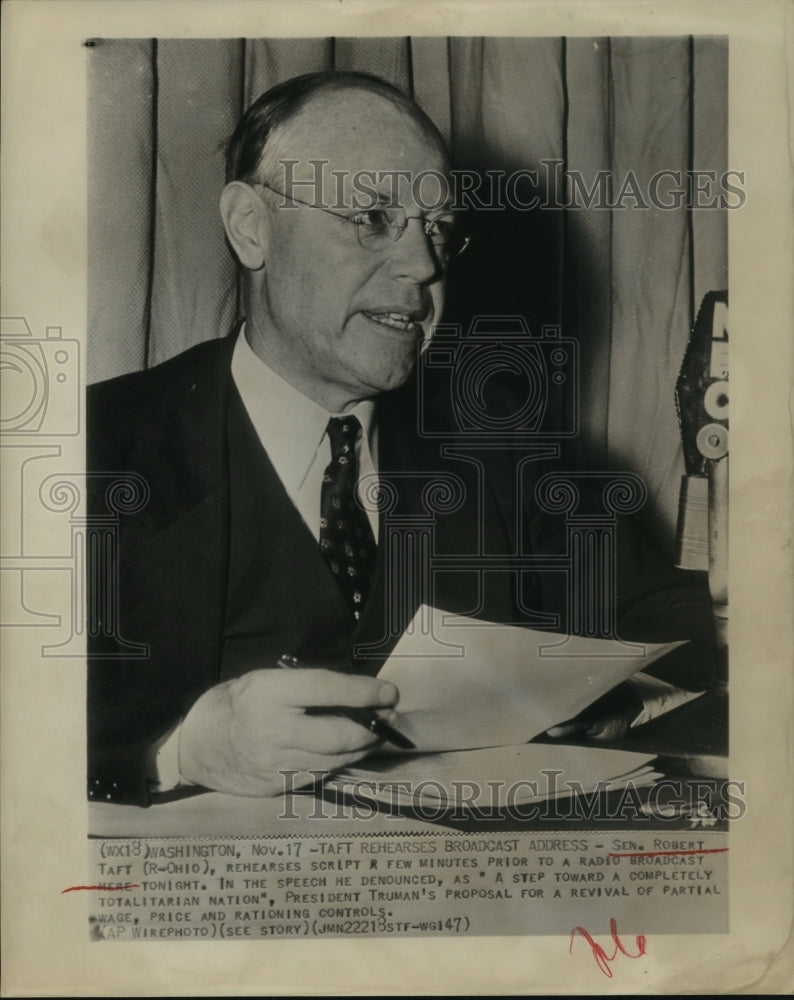 1947 Press Photo Sen. Robert Taft rehearses radio broadcast script for speech