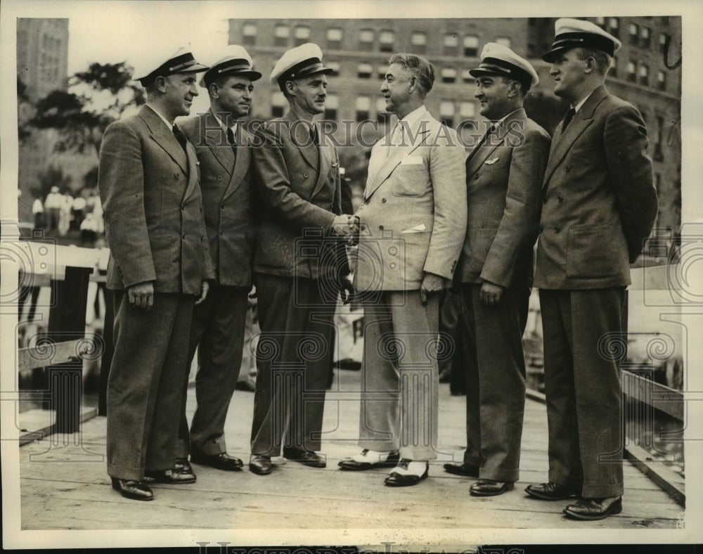 1934 Press Photo Lorain Gayton greets American flyers who will make world flight
