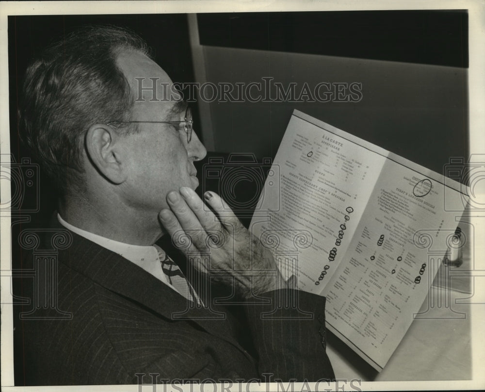 1942 Press Photo Sen. James M. Mead reading the new Senate restaurant menu- Historic Images