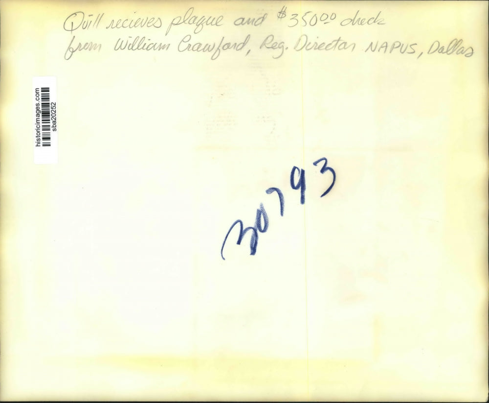 Press Photo Quill gets plaque & $350 check from William Crawford of NAPUS