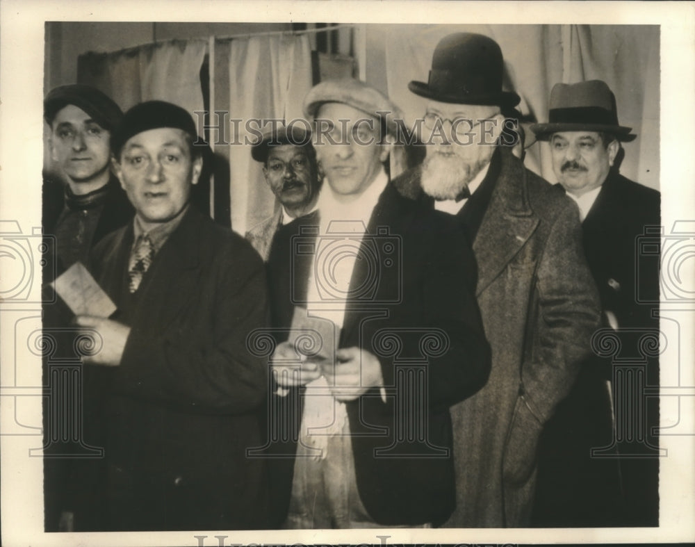 1936 Press Photo Former Premier Pierre Laval waits in line with workers to vote