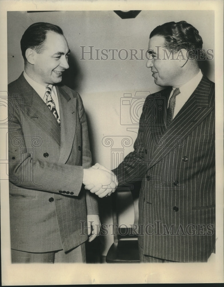 1945 Press Photo Hugh J. Devore and Ed Mckeever wishing each other good fortune- Historic Images