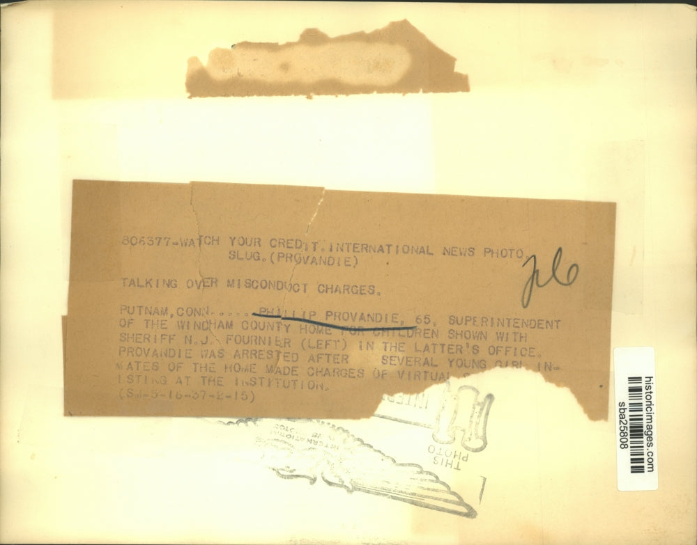 1937 Press Photo Phillip Provandie charged with misconduct shown with a sheriff