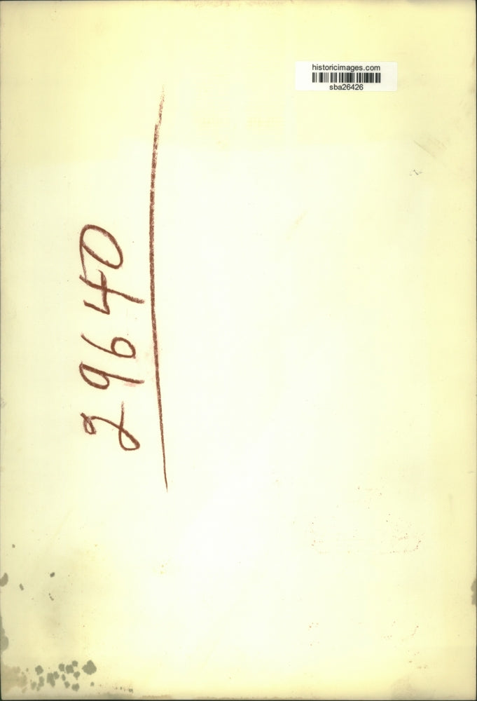 1947 Press Photo Arnold Tucker holds his trophy beside his fiancee in a ceremony