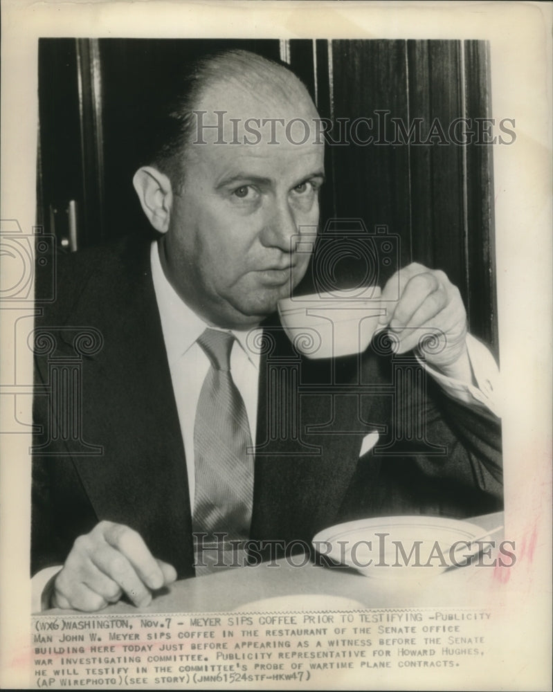 1947 Press Photo Publicity Man John W. Meyer sips his coffee in the restaurant
