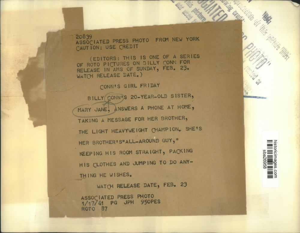 1941 Press Photo Mary Jane answers phone for boxing champion brother Billy Conn