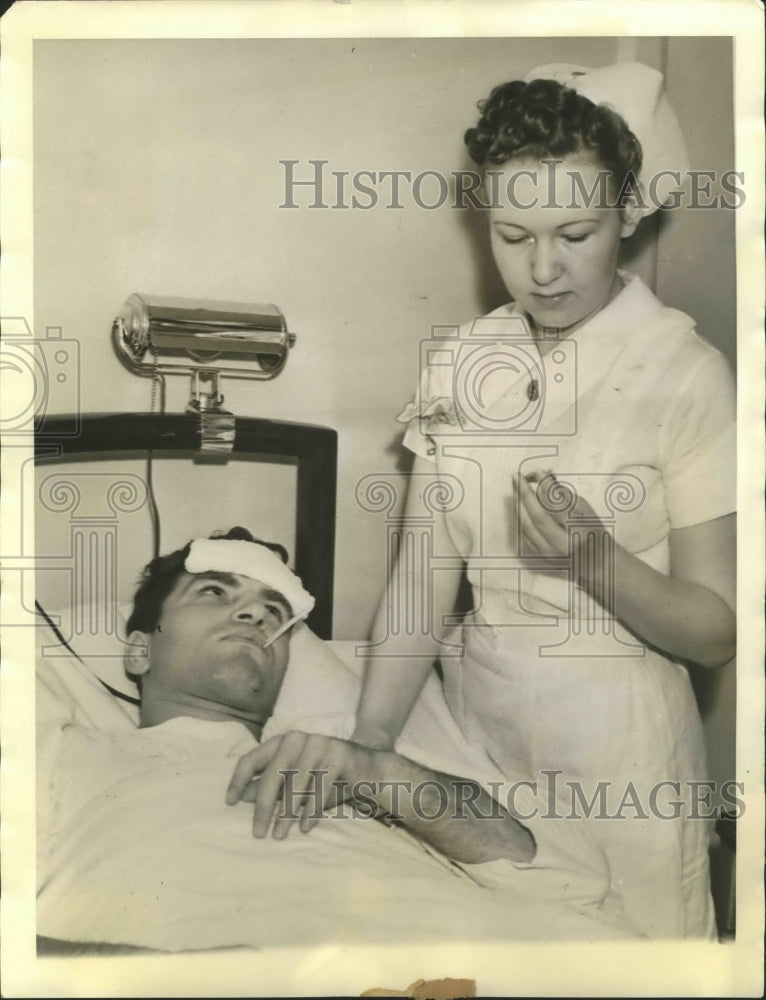 1940 Press Photo Lou Nova Gets Temperature Taken &amp; Pulse Counted - sbs00628- Historic Images