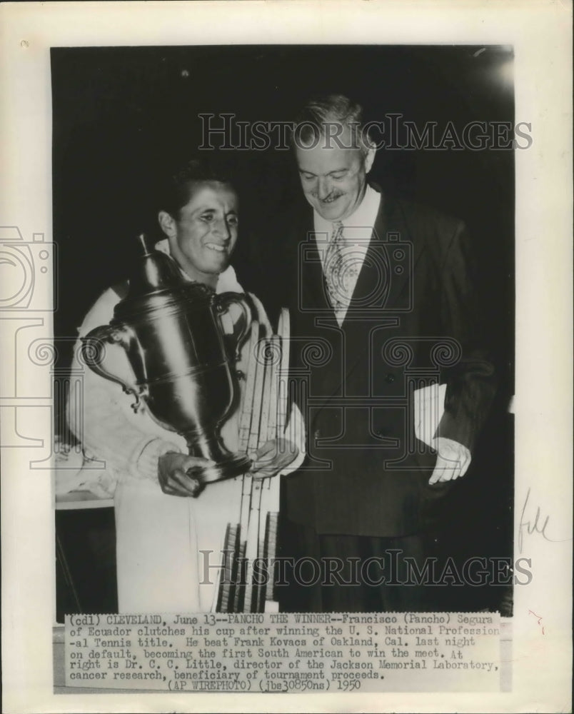 1950 Press Photo Francisco Segura clutches his cup - sbs00770- Historic Images