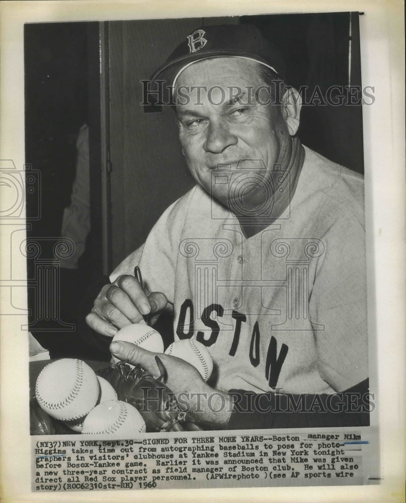 1960 Press Photo Mike Higgins takes time out from signing autographs - sbs00941- Historic Images