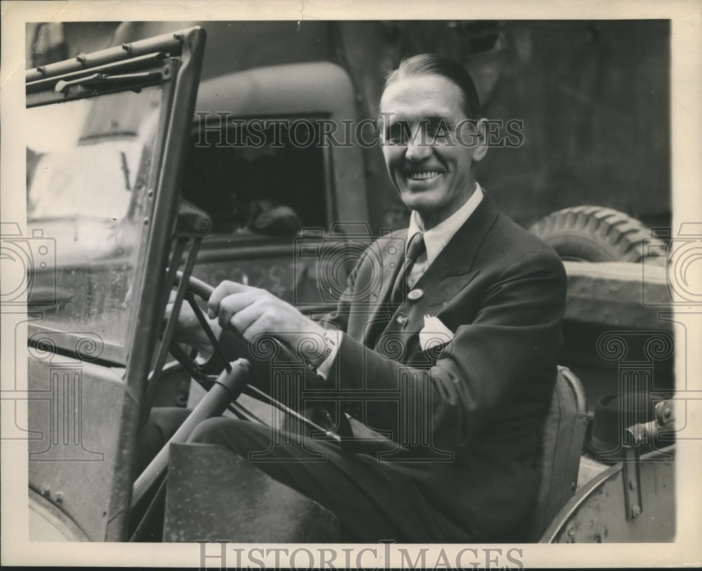 1944 Press Photo Georges Carpentier Driving American Jeep in Paris at Age Fifty- Historic Images