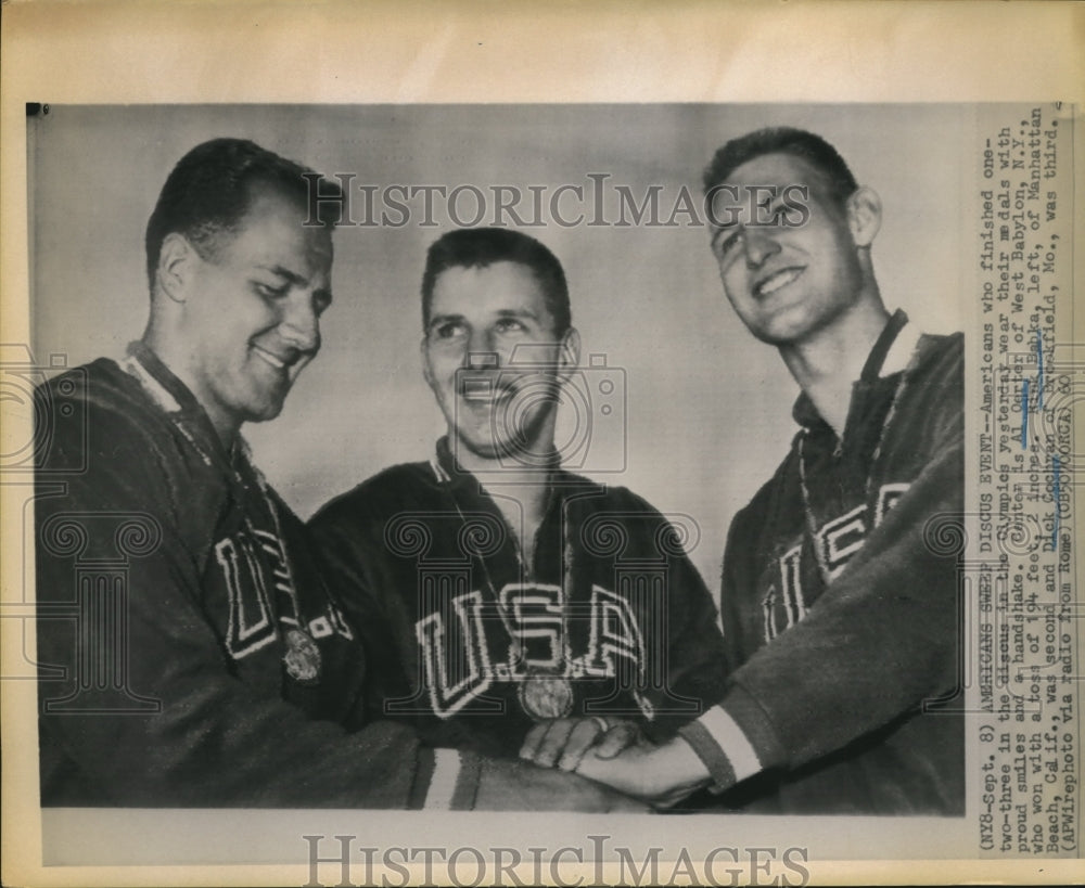 1960 Press Photo Oerter, Babka, Cochran proudly wear medals and a handshake- Historic Images