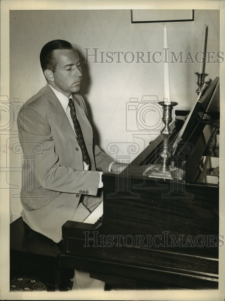 1941 Press Photo John Coolidge Playing Piano in Orange, Connecticut Home