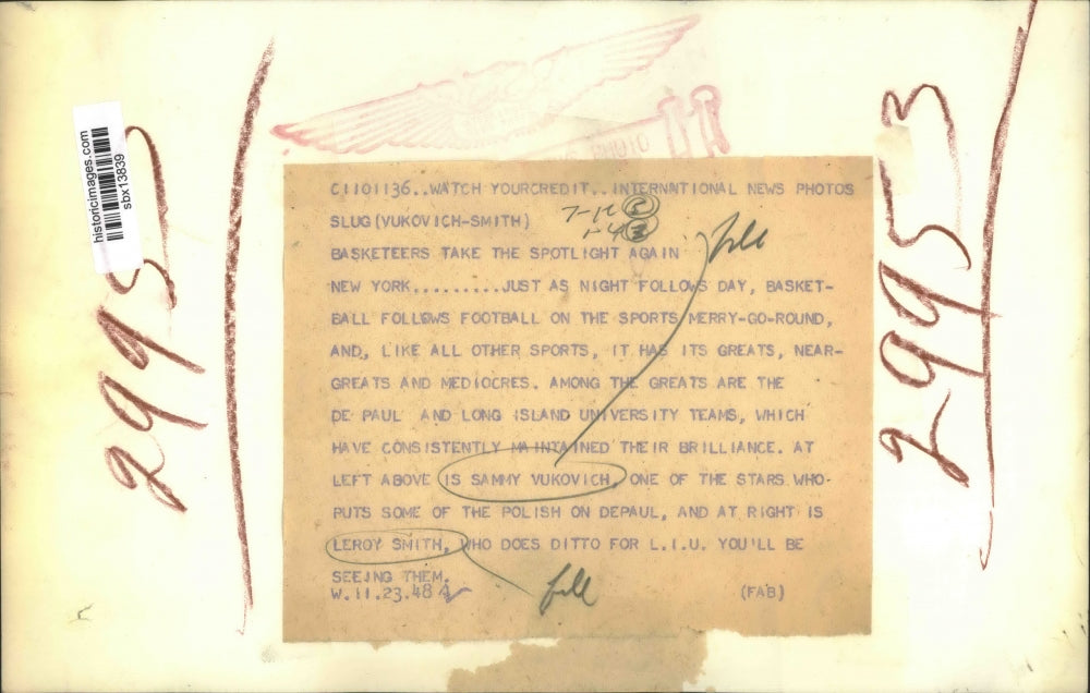 1948 Press Photo Basketball Players Sammy Vukovich and Leroy Smith - sbx13839