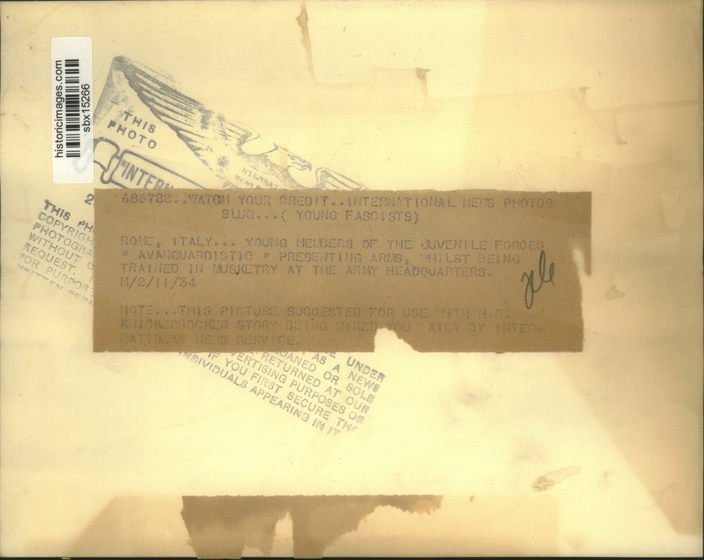 1934 Press Photo Members of Juvenile Forces "Avanguardisti" Presenting Arms