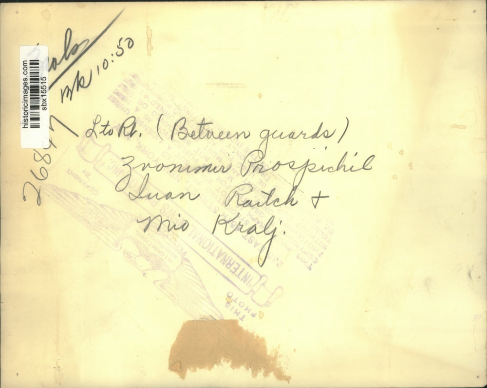 Press Photo Guards lined up in court