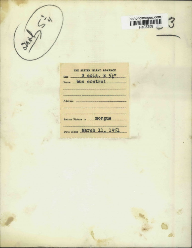 1951 Press Photo A bus official on the telephone - sia03259