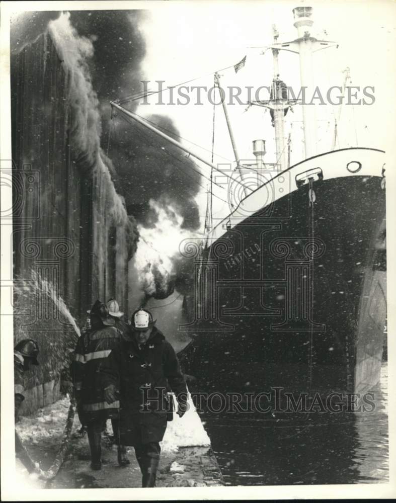 1967 Press Photo Firemen at boat fire at Pouch Terminal Pier 21 - sia14407