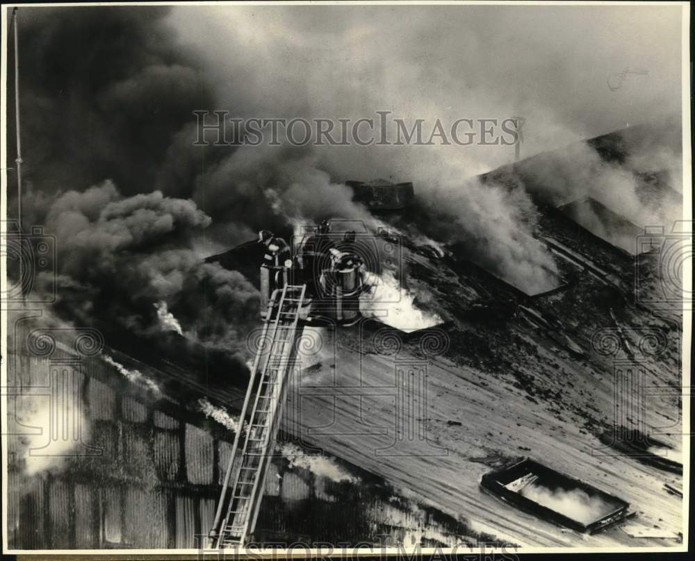 1979 Press Photo Firemen fighting Transit Authority warehouse fire - sia16887- Historic Images