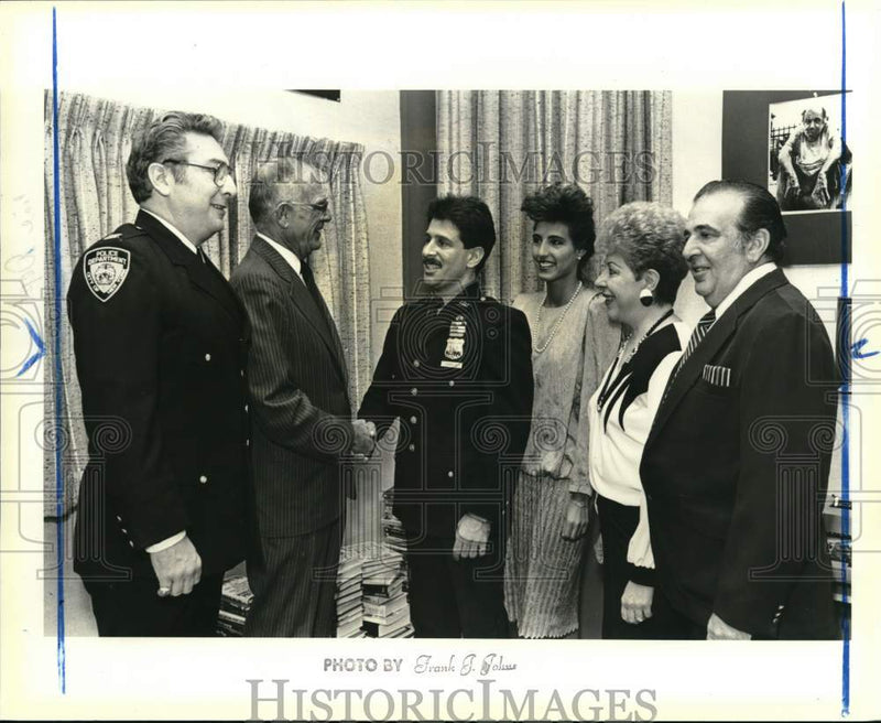 Load image into Gallery viewer, 1986 Press Photo Police Officer Michael Cipolla being honored at awards &amp; group
