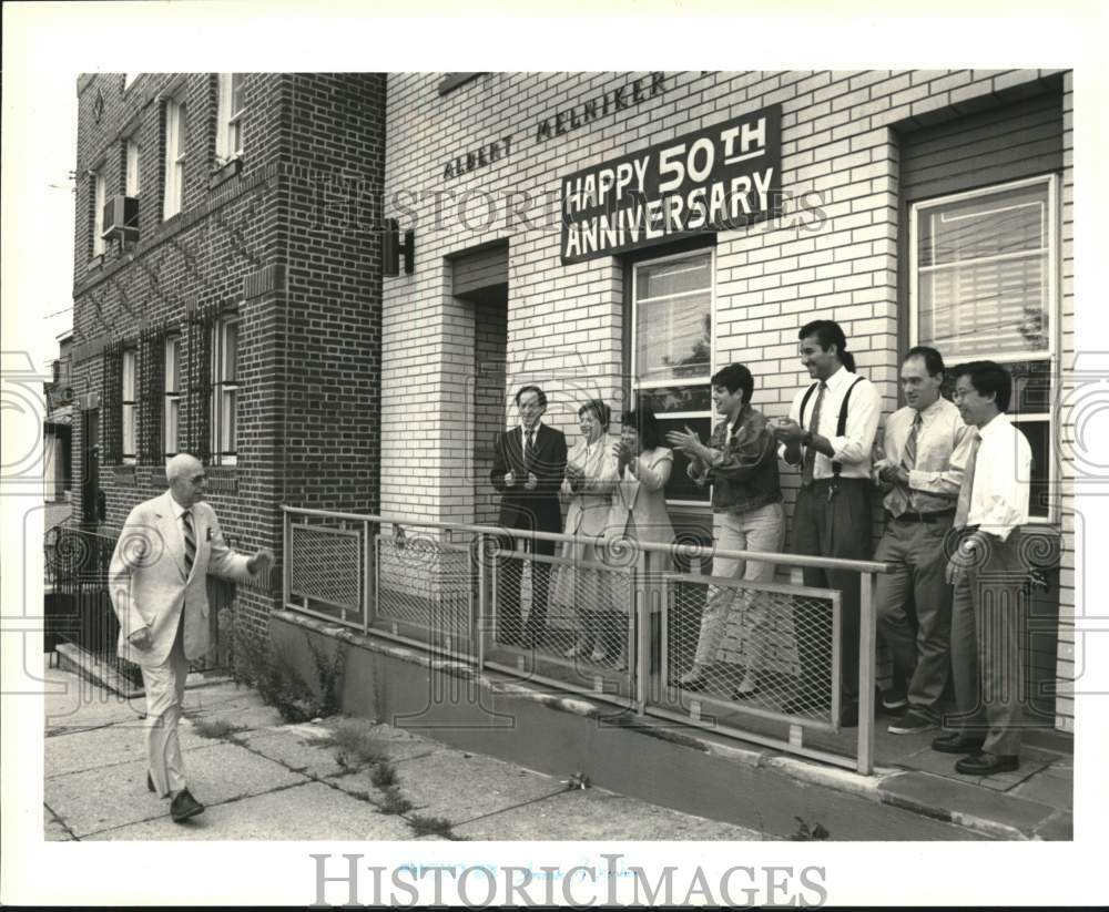 1990 Press Photo Albert Melniker being surprised by his employees - sia20376- Historic Images