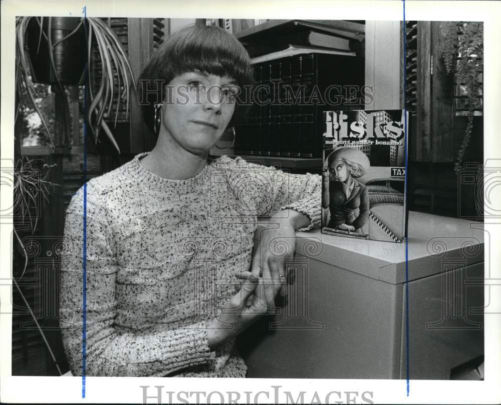 1989 Press Photo Author Margaret Bonanno with Her Book &quot;Risks&quot; - sia25140- Historic Images