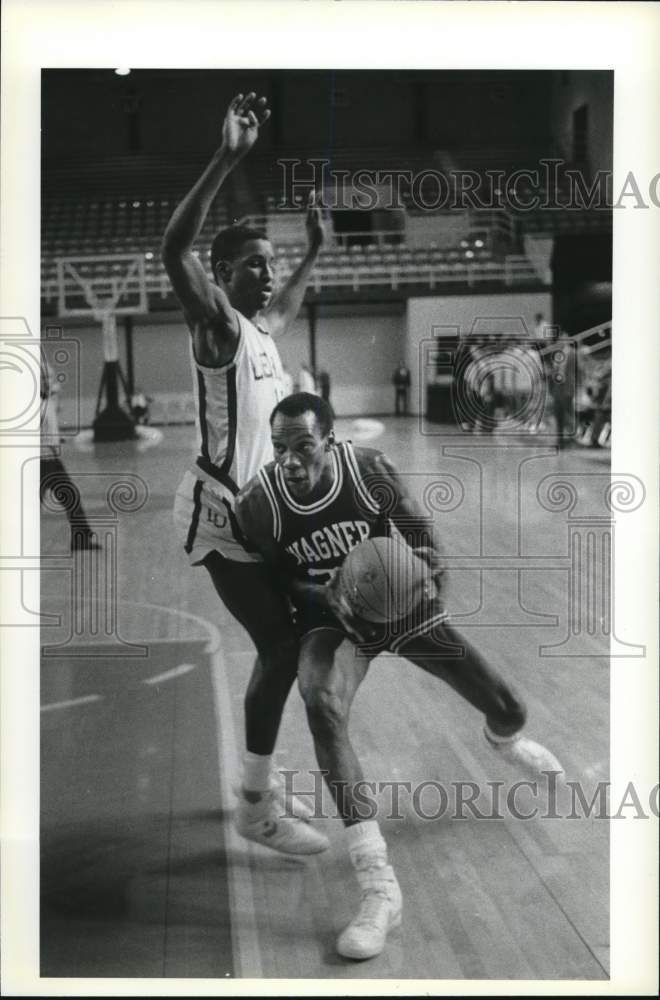 1984 Press Photo Wagner Basketball Player on Court at Game- Historic Images