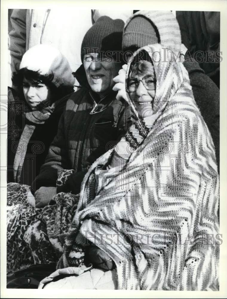 Press Photo Wagner football fans know coats, hats, afghans help them survive- Historic Images