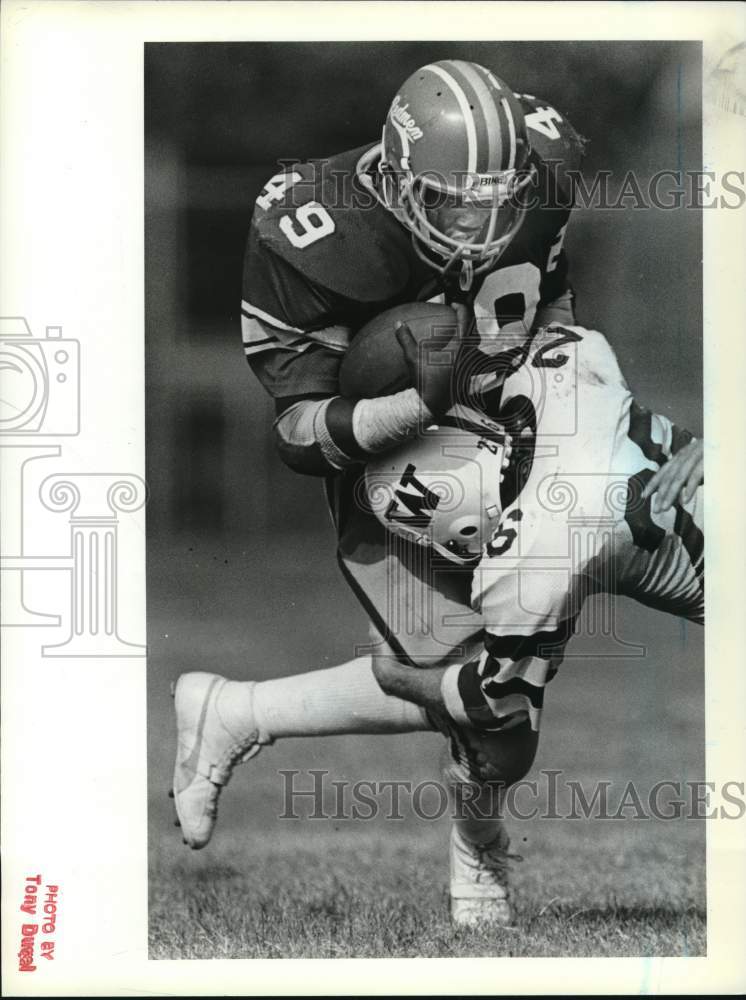 Press Photo Wagner College Football Player Tackles Opponent - sia31723- Historic Images