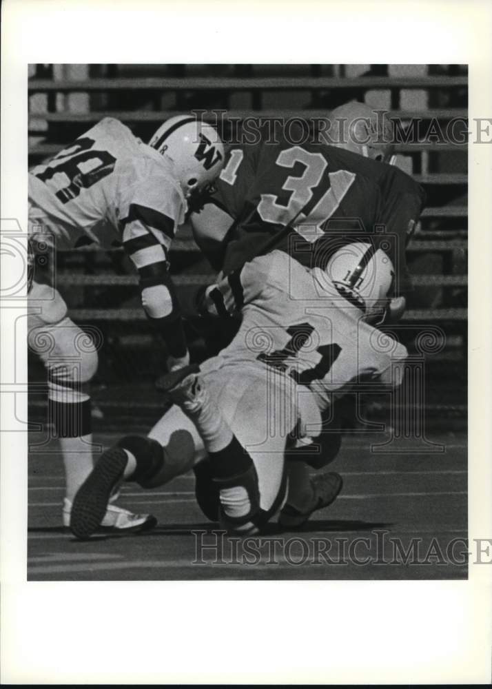 1983 Press Photo Wagner College Football Players Tackle Opponent - sia31789- Historic Images